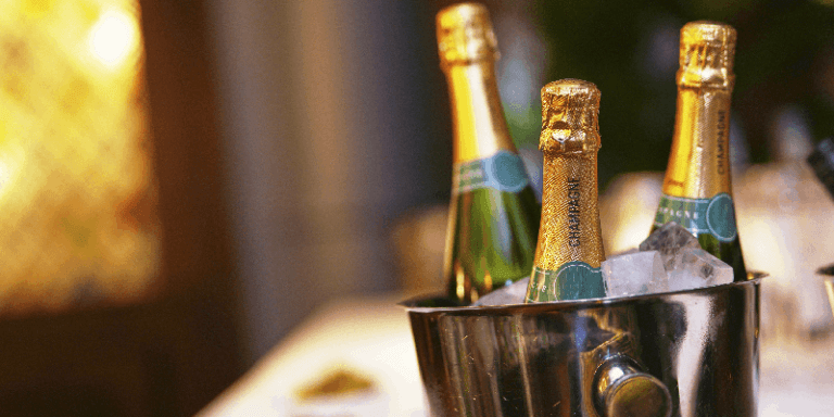 bottles of champagne in an ice bucket