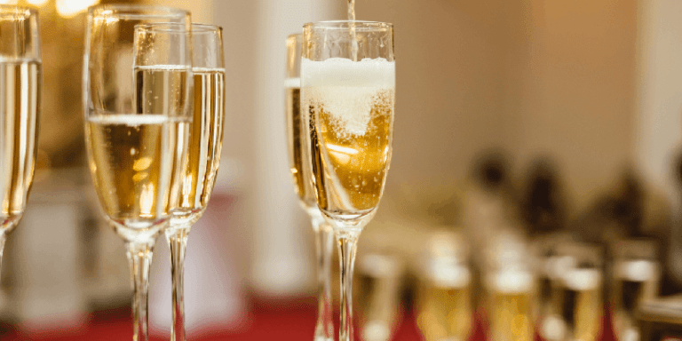 flute glasses filled with prosecco sparkling wine