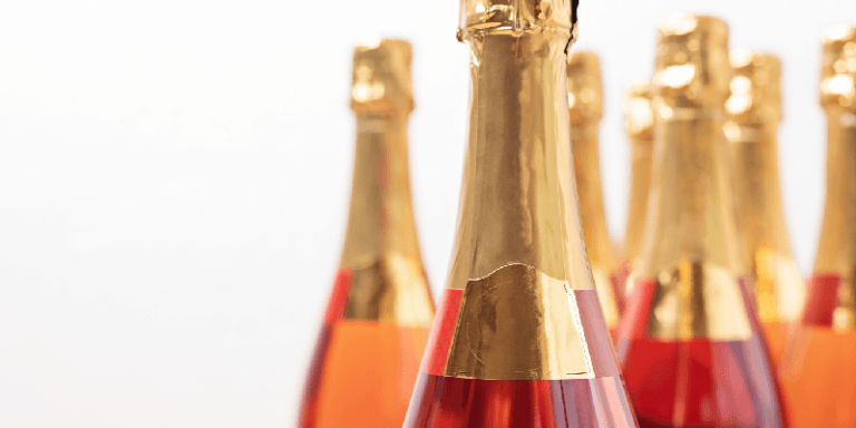 several bottles of sparkling red wine