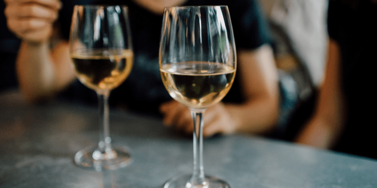 two glasses of white wine, chardonnay and sauignon blanc