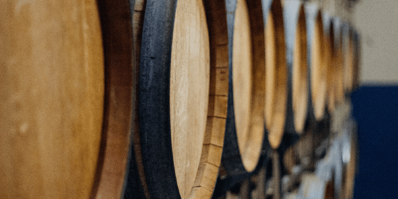 wine aging in oak barrels